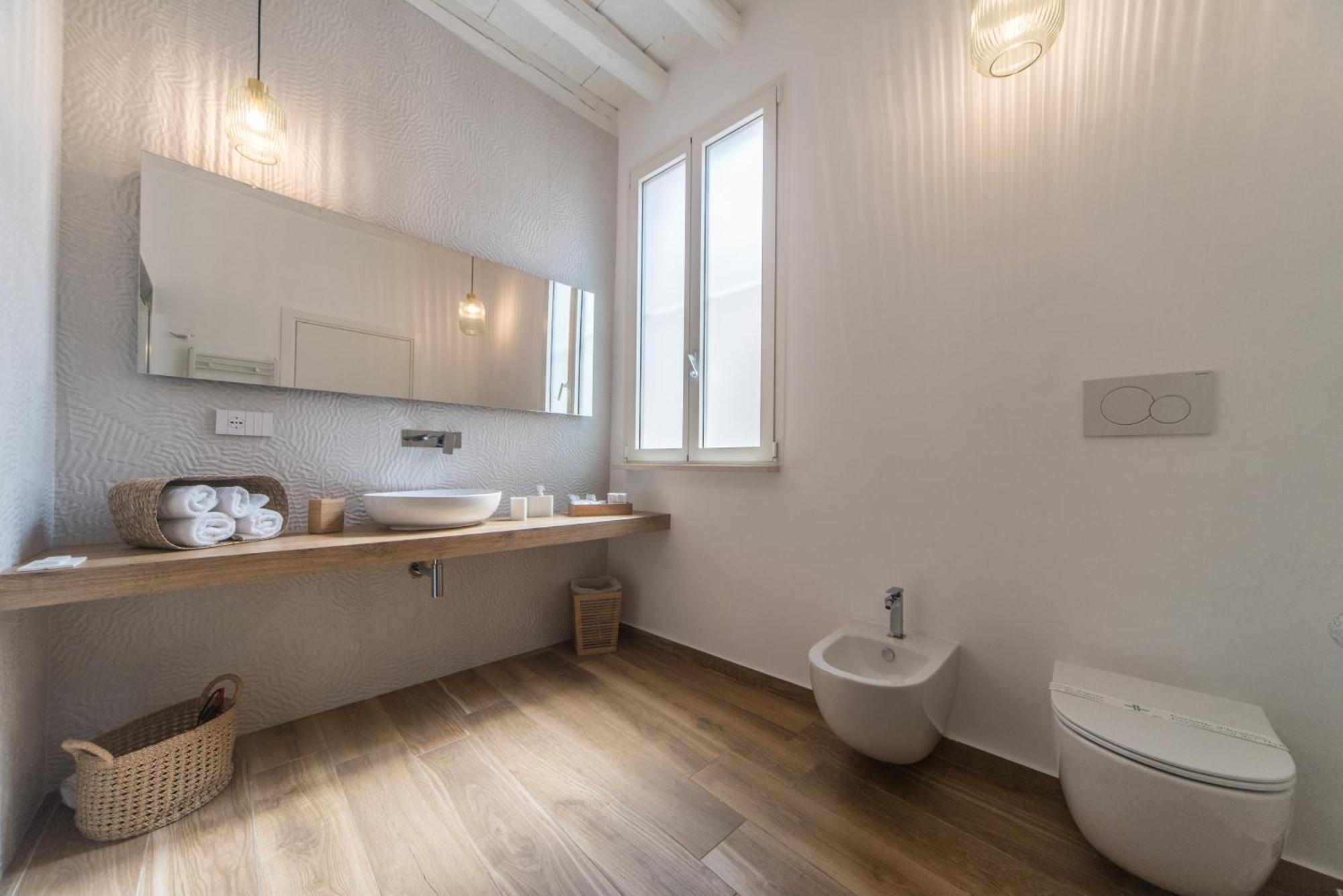 Suite Santa Chiara トラーニ 部屋 写真