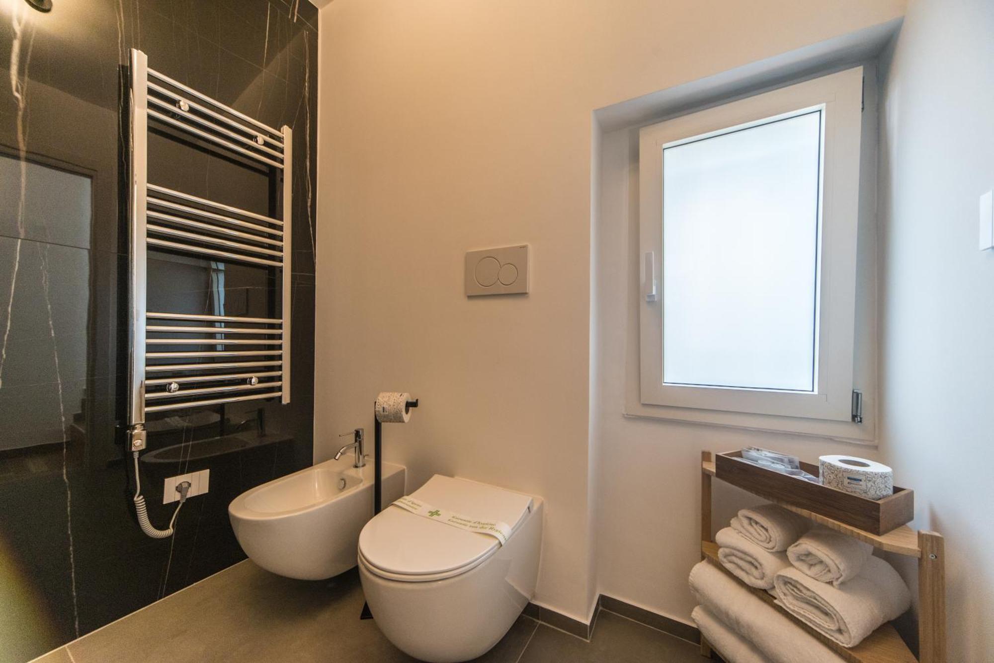 Suite Santa Chiara トラーニ 部屋 写真
